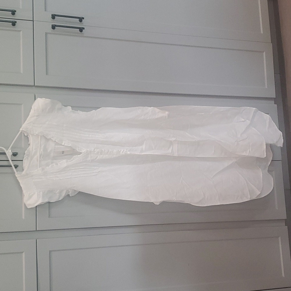 woman's Anthropologie swimsuit coverup linen